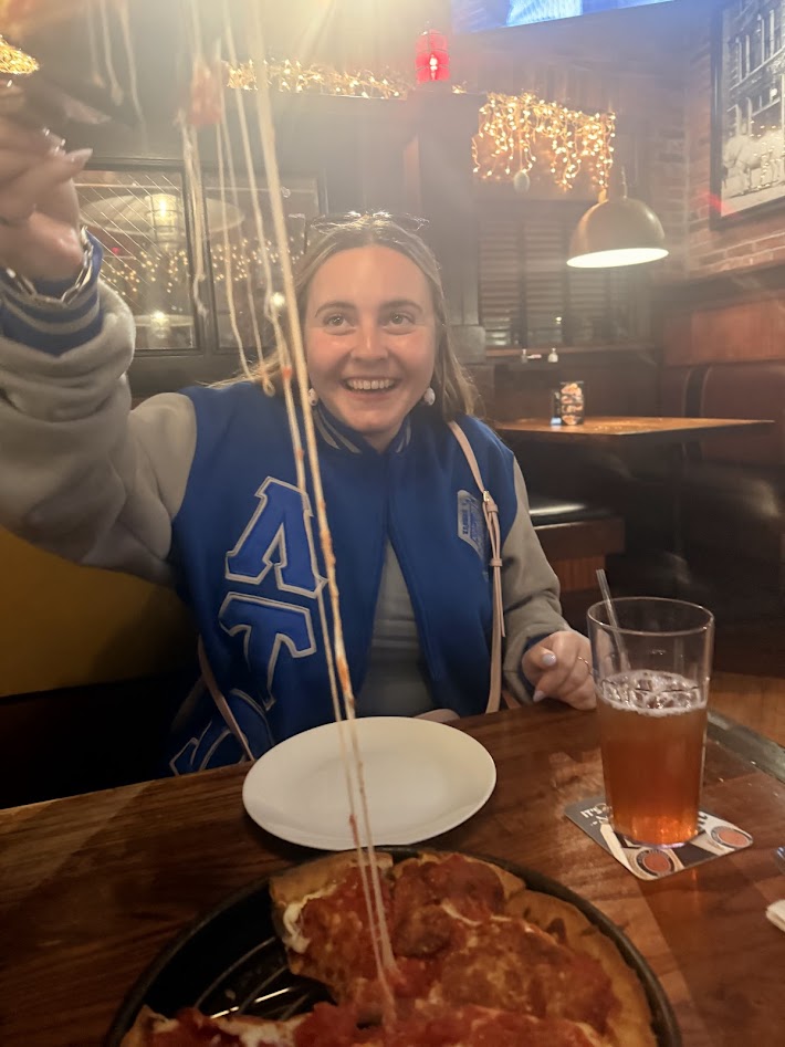 Bridget trying Chicago Style Pizza